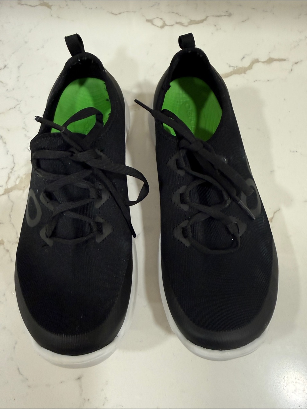 OOFOS Women Black Athletic Slip-On Shoes with White Soles